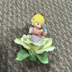 Precious moment Figurine with Yellow Flower